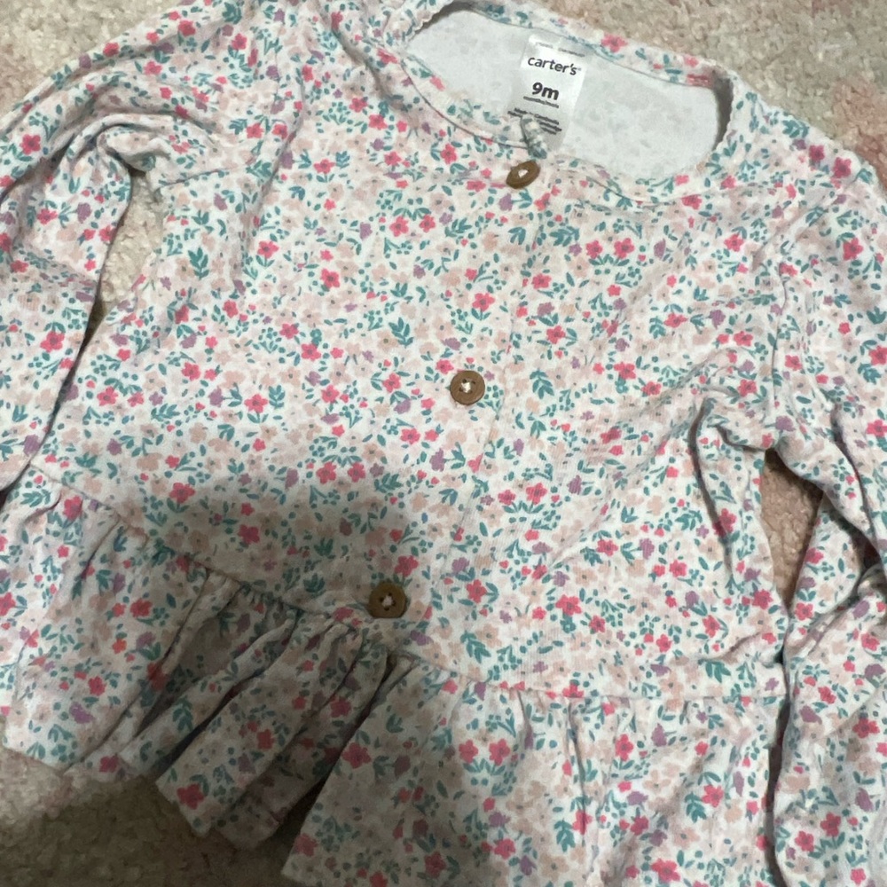 9 months. Carter’s brand. Long sleeve button up shirt. Used condition.